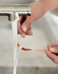 Raspador de lengua de cobre