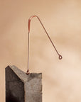 Raspador de lengua de cobre