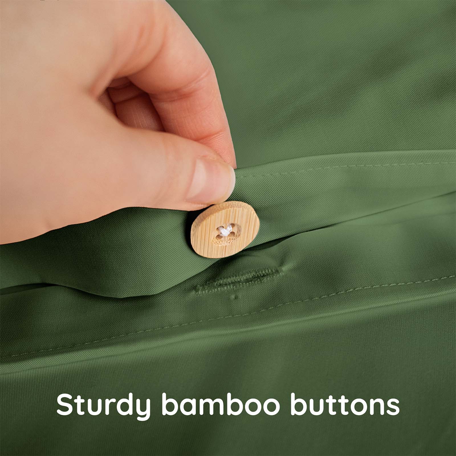 Hand pressing a wooden button on a green fabric with text 'Sturdy bamboo buttons'.
