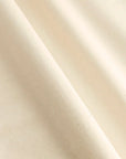 Close-up of natural raw white untreated fabric with a subtle texture 100% cotton City to Ocean donation
